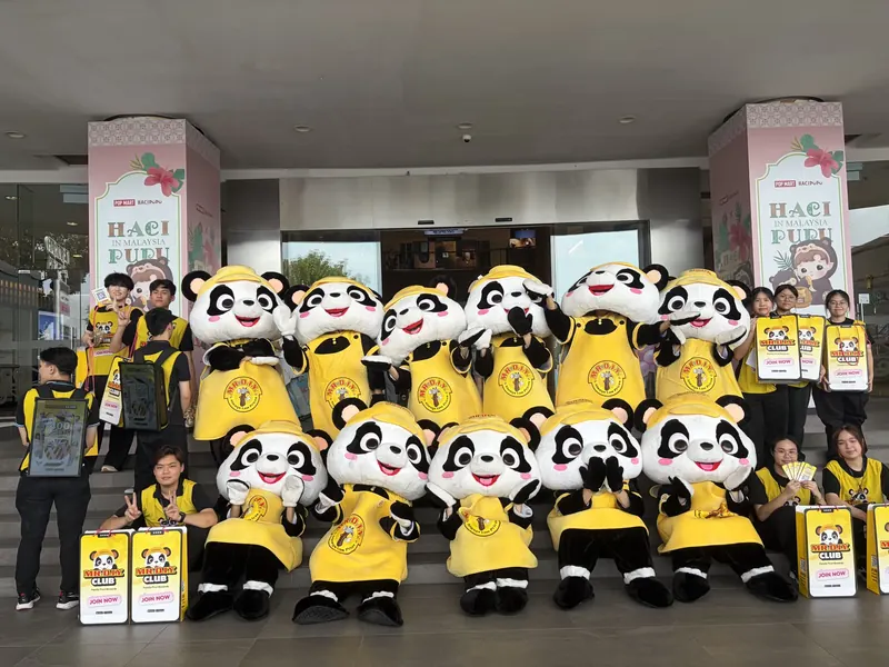 The PANDAi mascot and promoter team during the afternoon activation in Penang