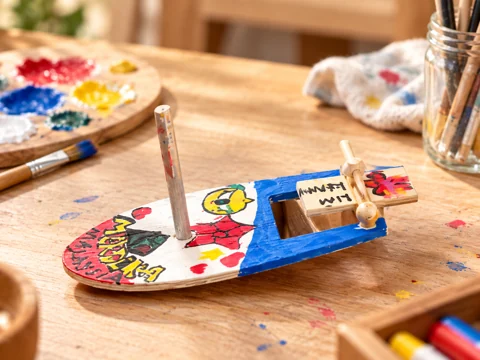 Wooden boat painting workshop creation