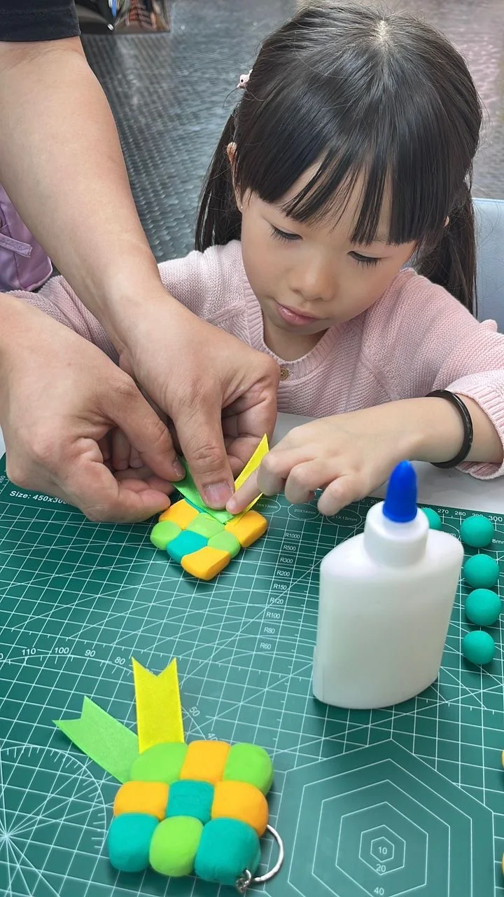Clay ketupat keychains in the workshop source photographs