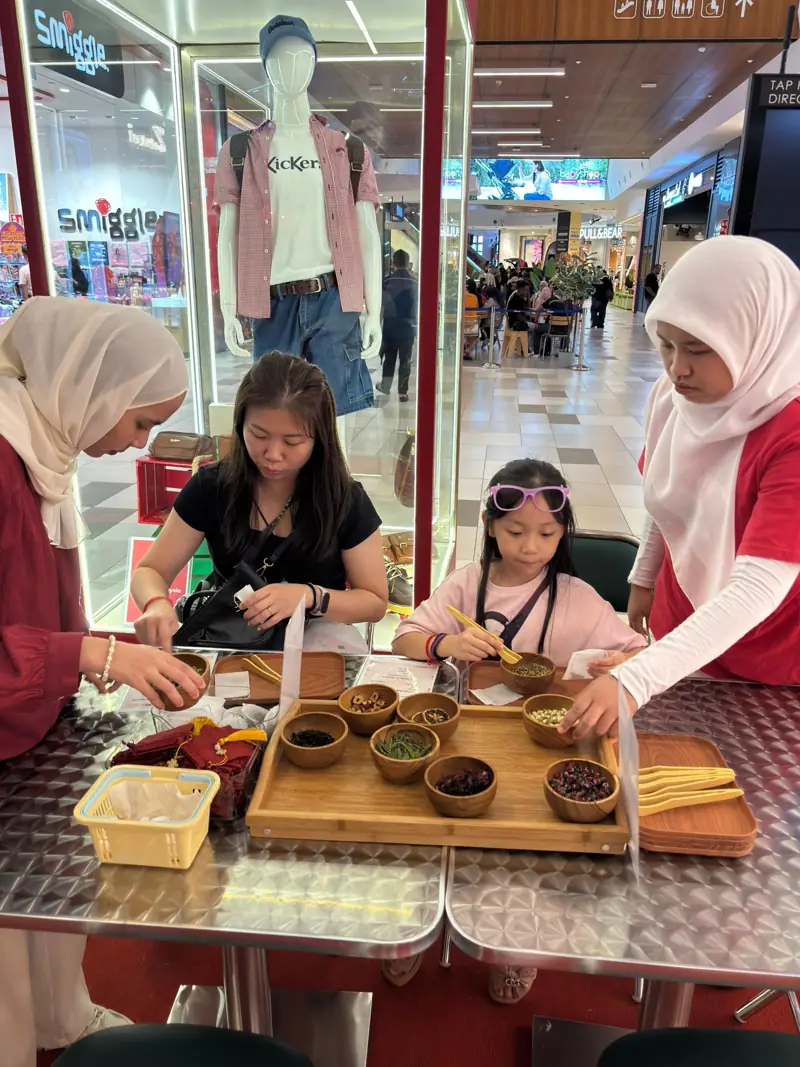 Custom tea bags at MyTown CNY · February 2026 — photo 3